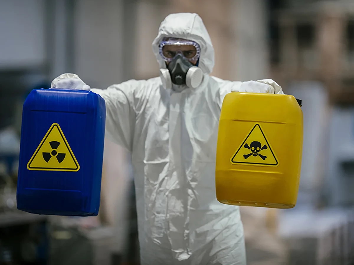 Biohazard cleanup technicians in protective equipment at a remediation scene in Golden, CO